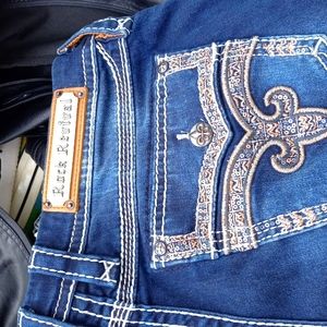 32dark blue rock revival jeans